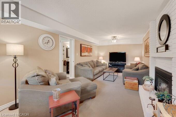4162 Sutherland Crescent, Burlington, ON - Indoor Photo Showing Living Room With Fireplace