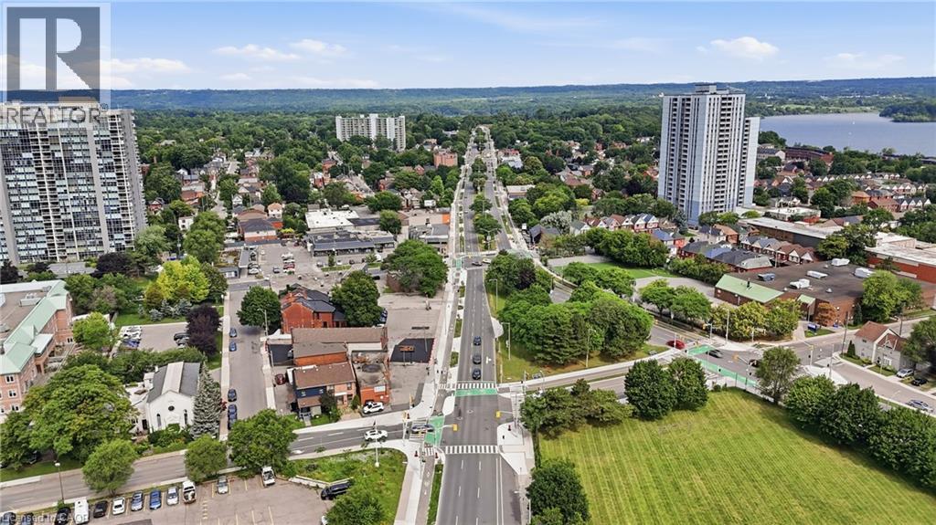 Aerial perspective showcasing a vibrant urban landscape with extensive tree canopy - 239 York Boulevard, Hamilton, ON
