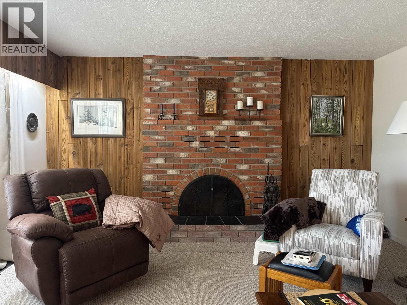 2400 Arnoldus Road, Quesnel, BC - Indoor Photo Showing Living Room With Fireplace