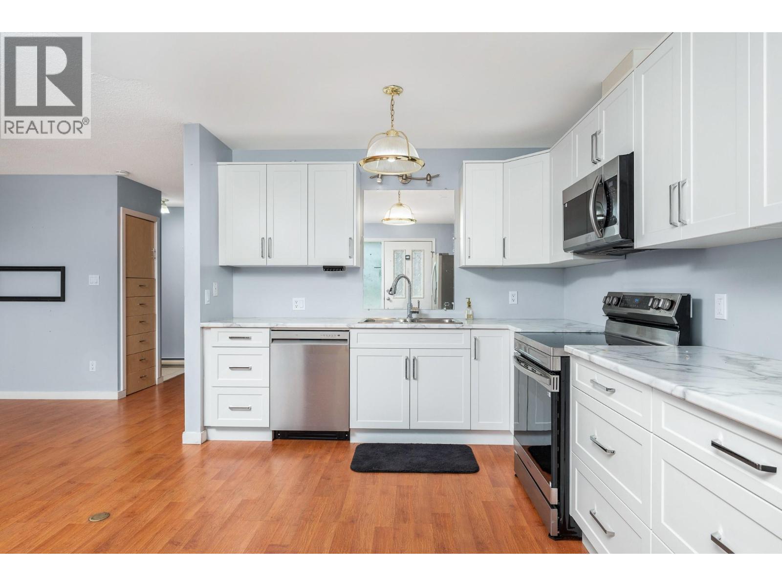 From the front entrance - 5008 Heritage Drive, Vernon, BC - Indoor Photo Showing Kitchen