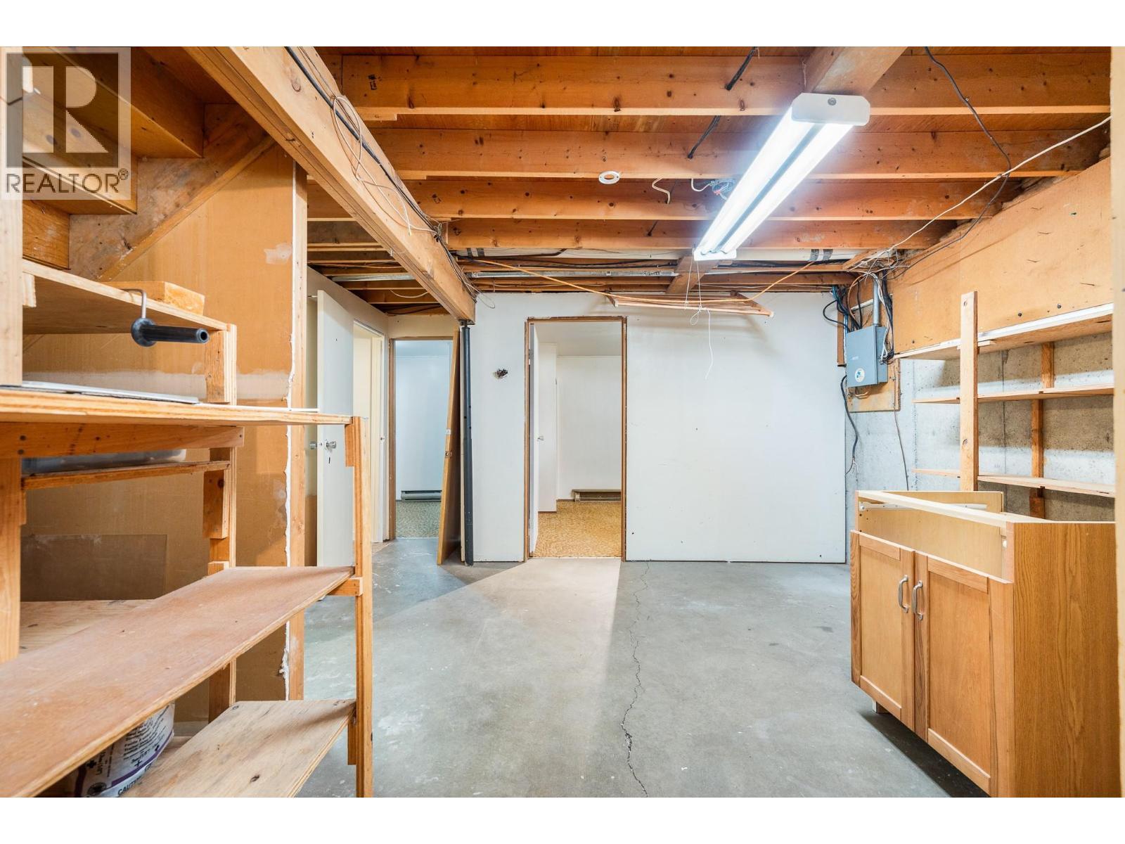 Huge storage in the basement - 5008 Heritage Drive, Vernon, BC - Indoor Photo Showing Basement