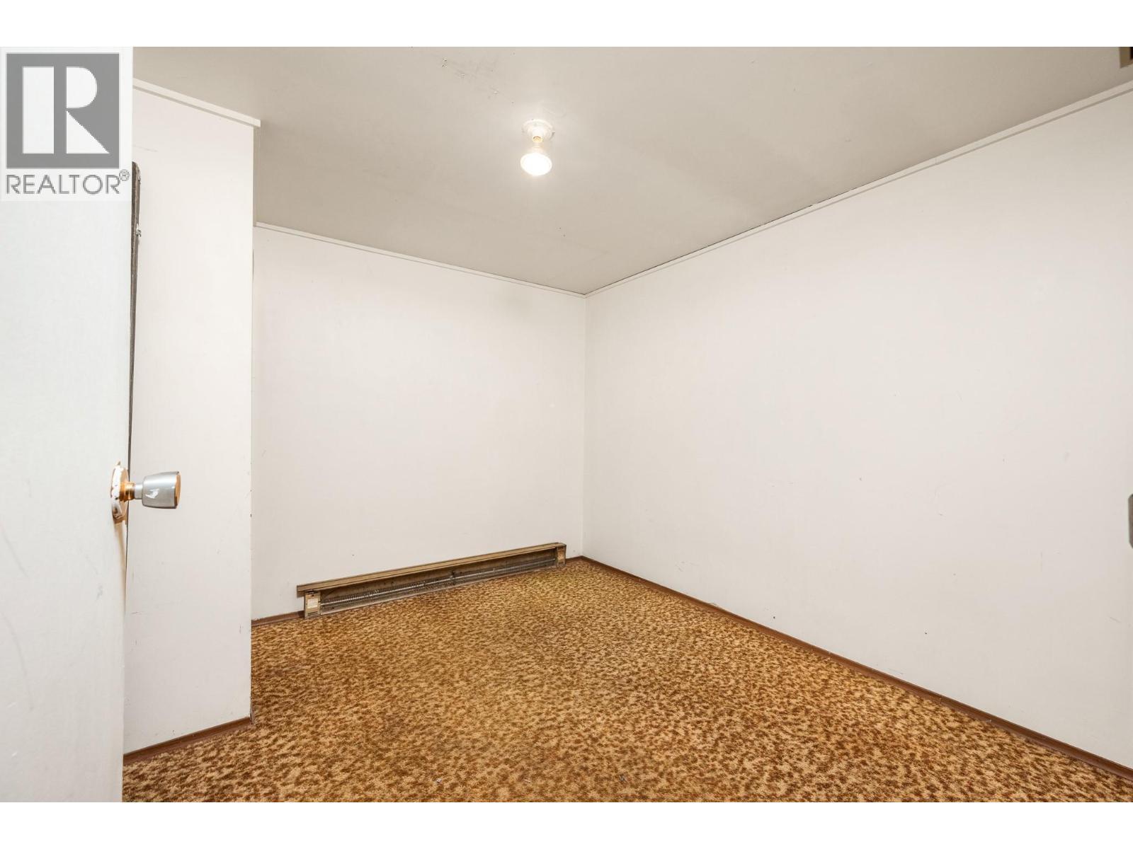 Back storage room 1 in basement - 5008 Heritage Drive, Vernon, BC - Indoor Photo Showing Other Room
