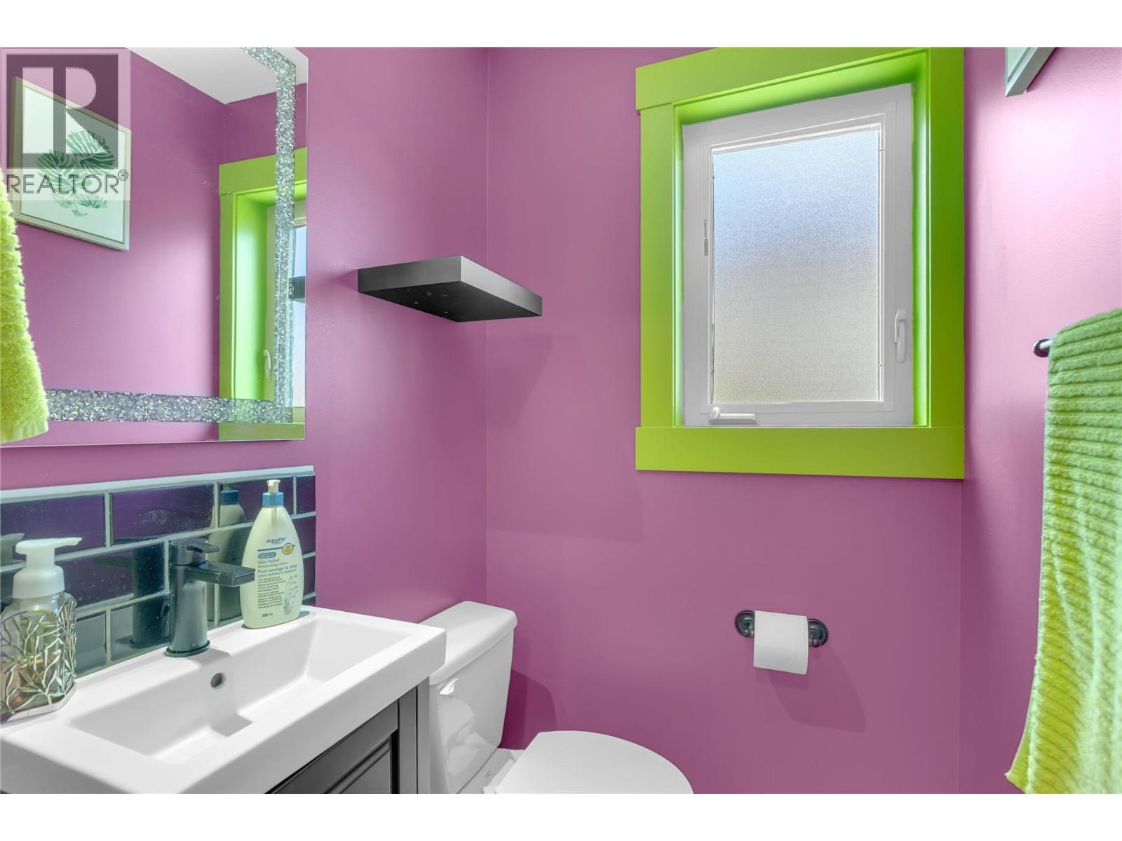 Powder room on the main floor. Just beside the dining area. - 128-1651 Lynrick Road, Kelowna, BC