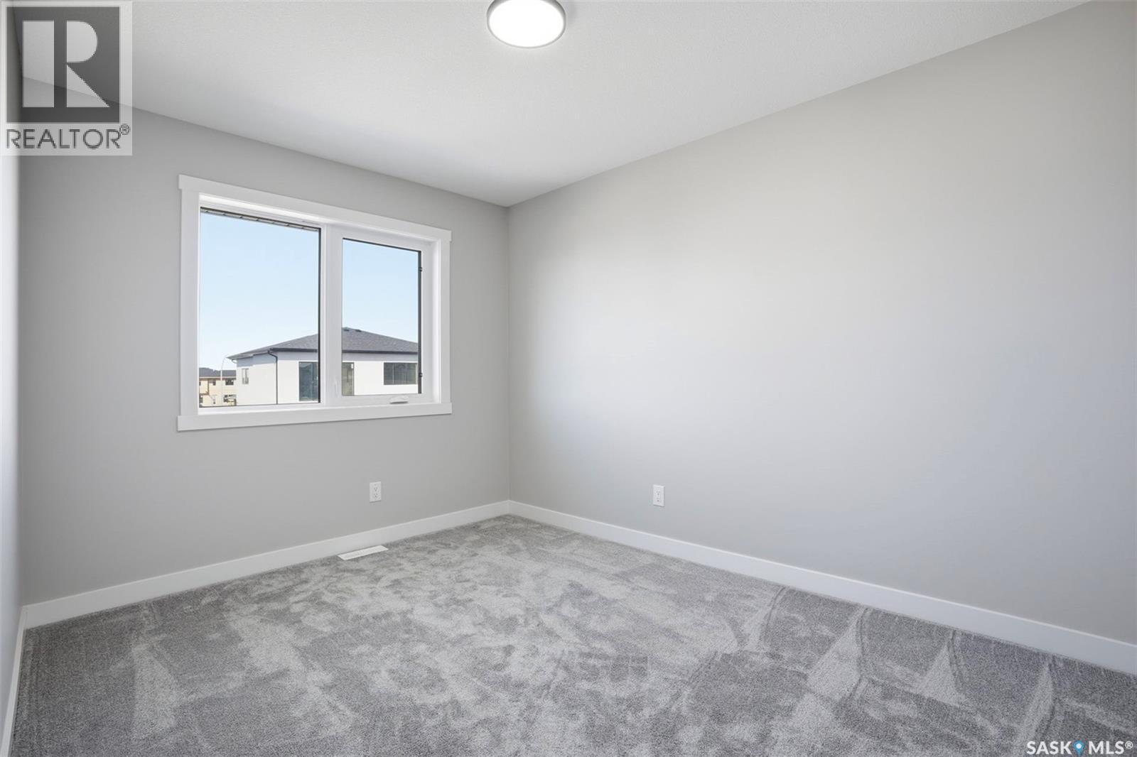 203 Sharma Lane, Saskatoon, SK - Indoor Photo Showing Other Room