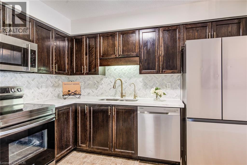 208 Featherstone Crescent, Kitchener, ON - Indoor Photo Showing Kitchen With Double Sink