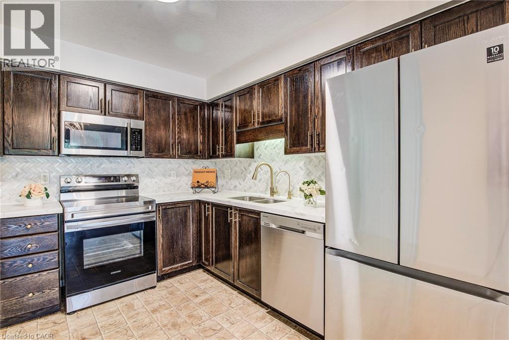 208 Featherstone Crescent, Kitchener, ON - Indoor Photo Showing Kitchen With Double Sink