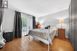 Main Floor Bedroom with Sliders to Deck - 