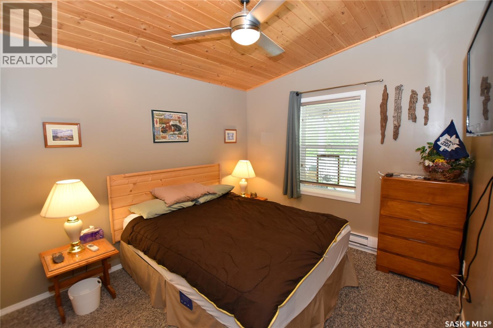 134 Sunridge Road, Pebble Baye, SK - Indoor Photo Showing Bedroom