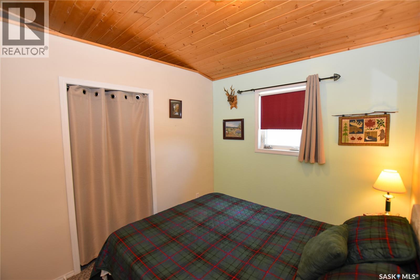 134 Sunridge Road, Pebble Baye, SK - Indoor Photo Showing Bedroom
