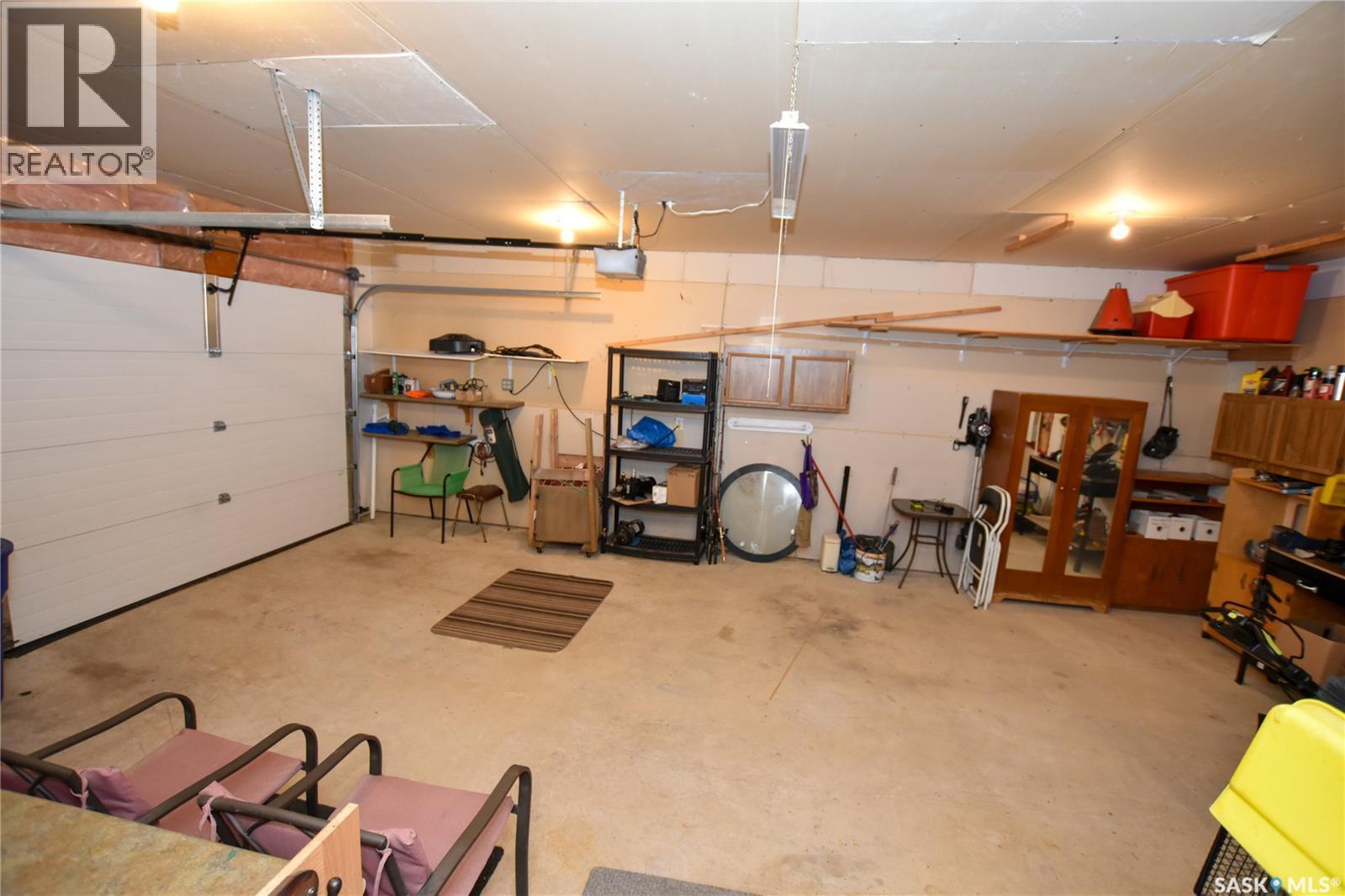 134 Sunridge Road, Pebble Baye, SK - Indoor Photo Showing Garage