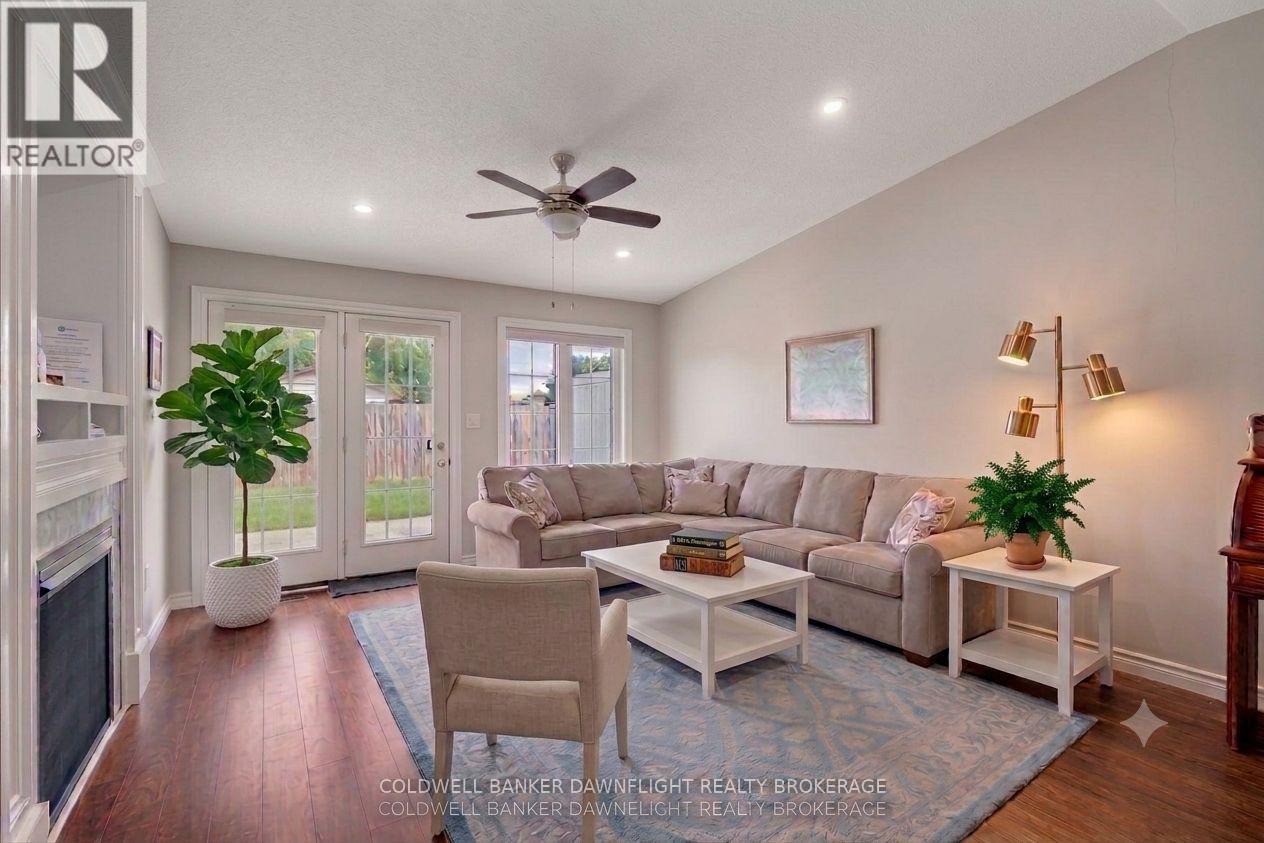 Virtually Staged- AI Generated - 40 Devon Drive, South Huron (Exeter), ON - Indoor Photo Showing Living Room With Fireplace