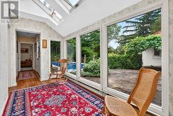 Hallway w/skylights, windows on courtyard, walkout - 