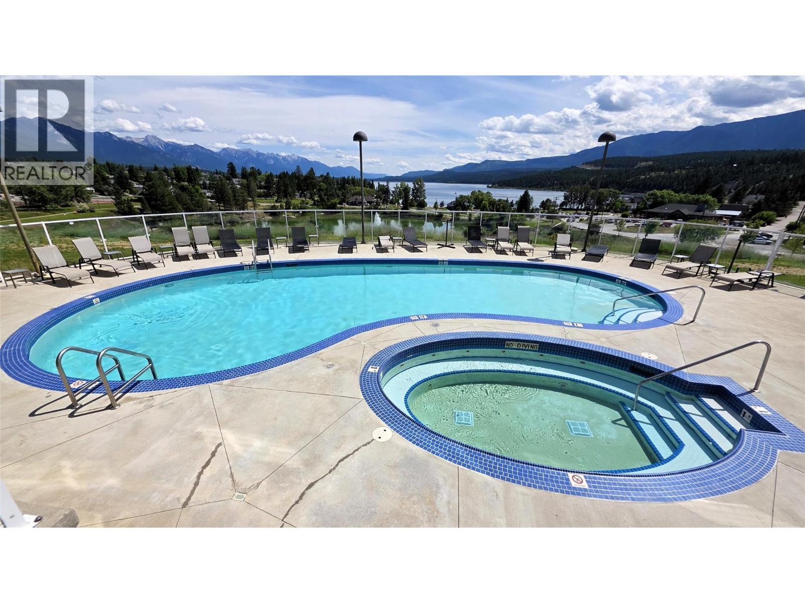 701 14A Crescent Unit# 213 I, Invermere, BC - Outdoor With In Ground Pool With View