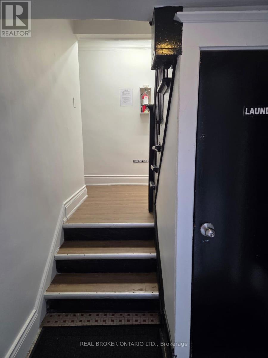 Laundry is located in the basement of the building - 6 - 983 Main Street E, Hamilton, ON