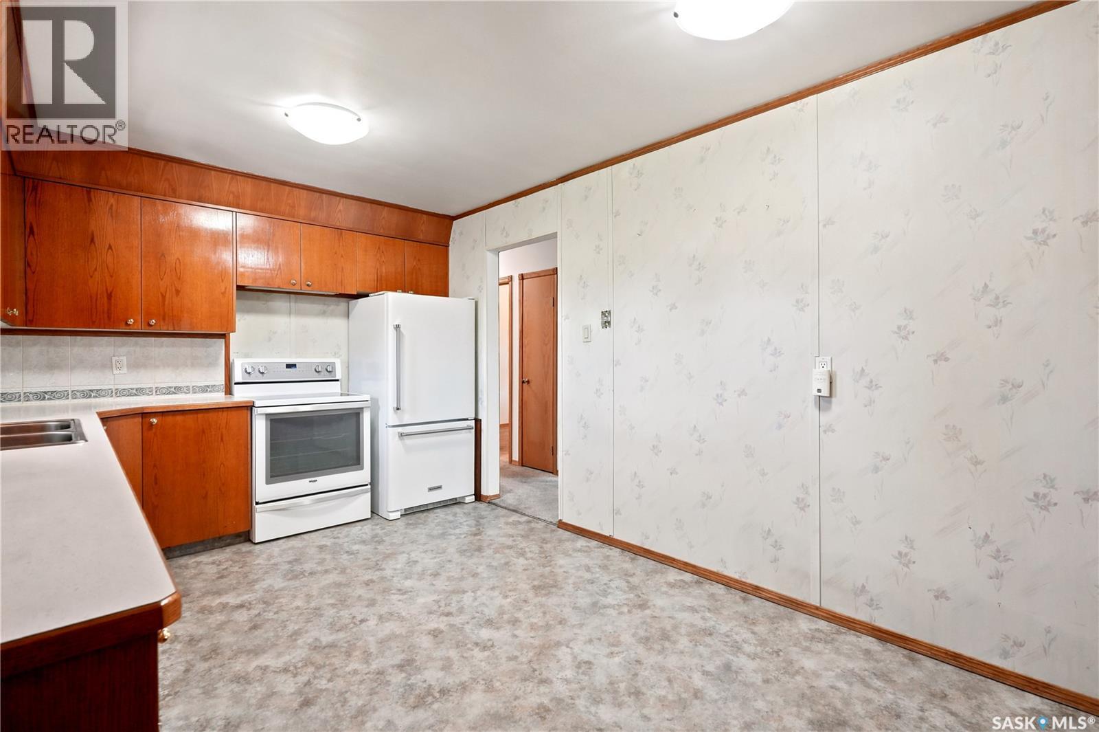 3326 4Th Avenue N, Regina, SK - Indoor Photo Showing Kitchen With Double Sink