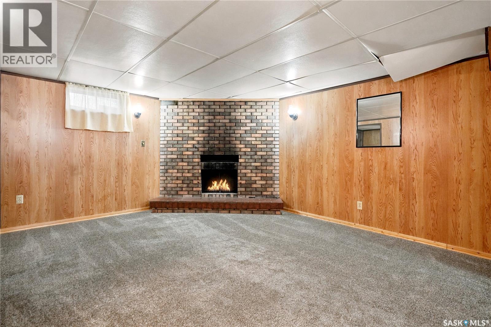 3326 4Th Avenue N, Regina, SK - Indoor With Fireplace