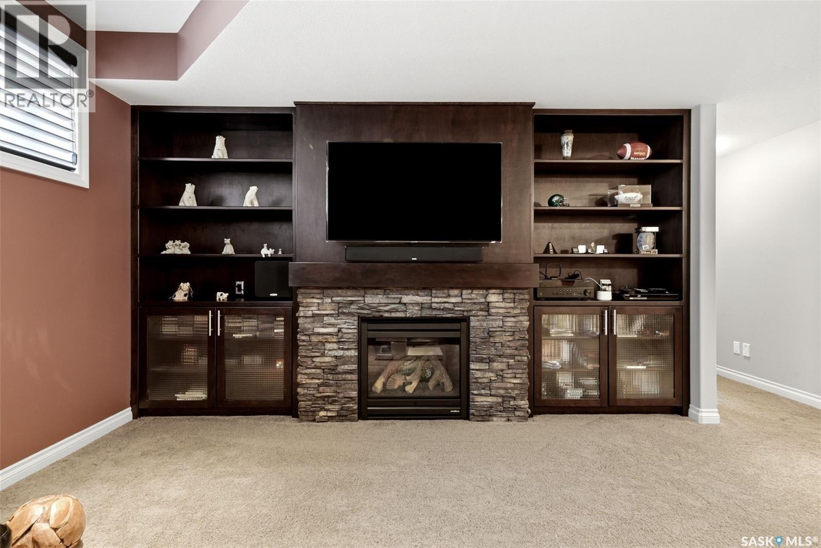 4127 Chuka Drive, Regina, SK - Indoor With Fireplace