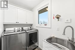 MAIN FLOOR LAUNDRY SINK & CLOSET - 