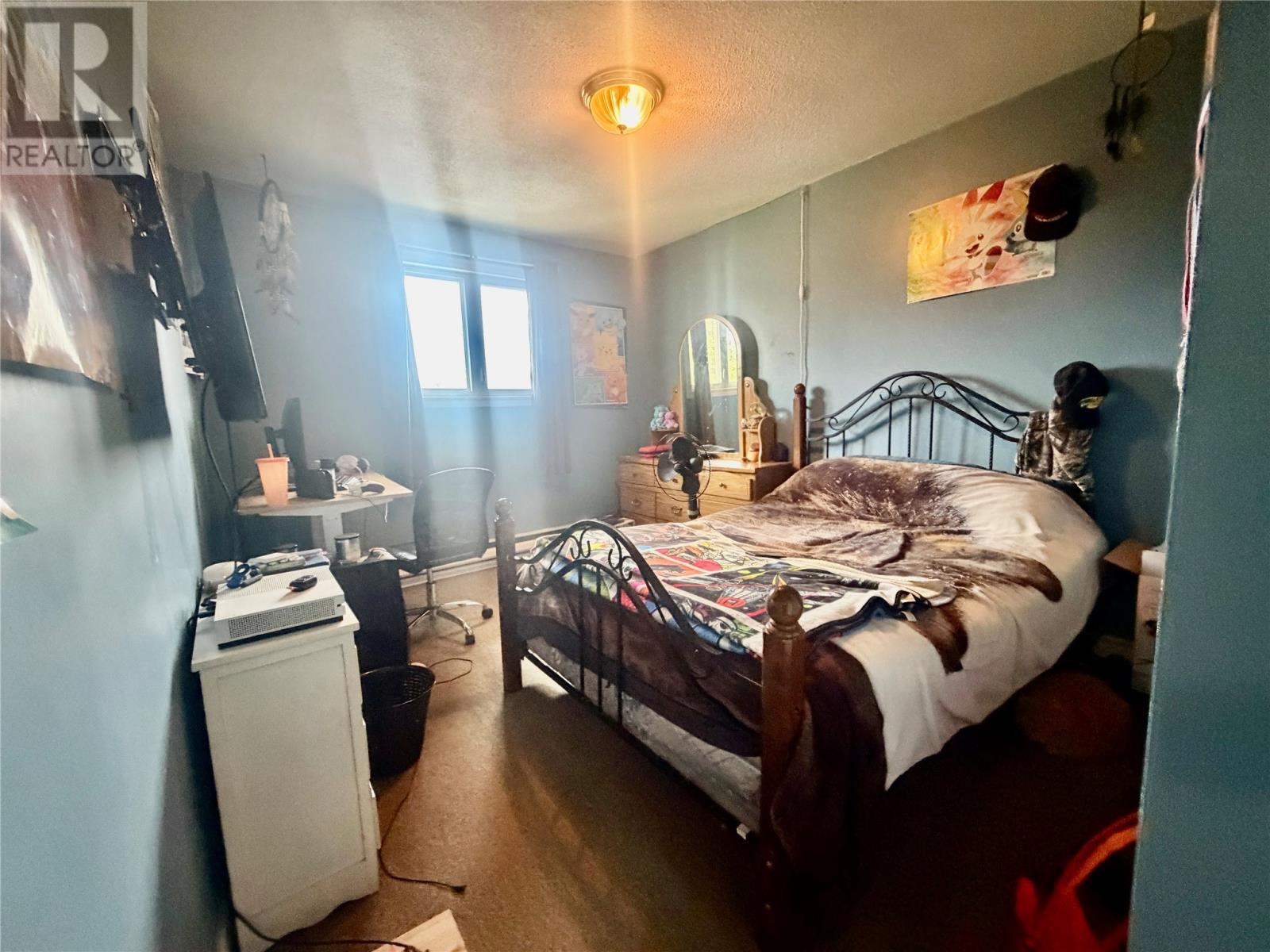 231-233 Creston Boulevard, Creston, NL - Indoor Photo Showing Bedroom