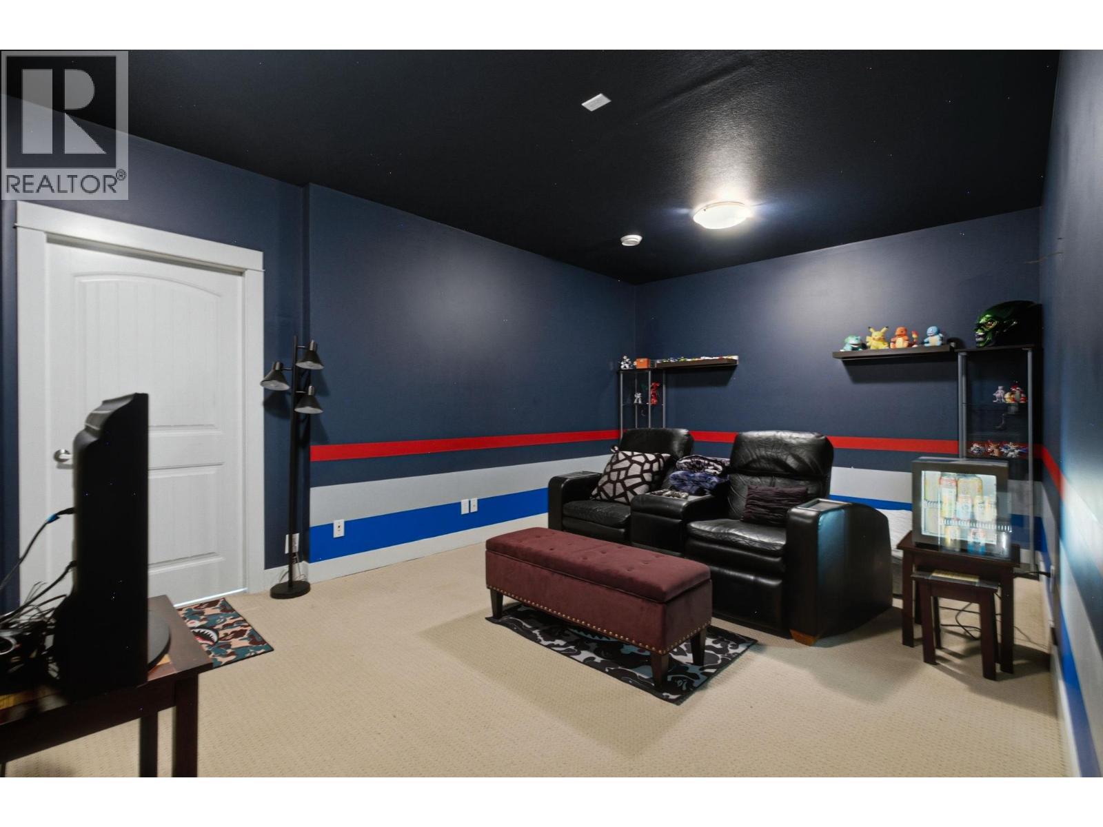 Basement level media room - 1115 Bentien Road, Kelowna, BC