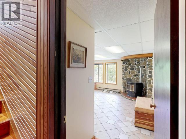 9573 Larson Road, Powell River, BC - Indoor Photo Showing Other Room With Fireplace