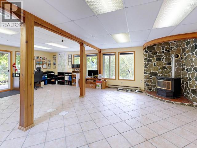 9573 Larson Road, Powell River, BC - Indoor Photo Showing Other Room With Fireplace