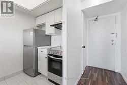 KITCHEN & FRONT HALLWAY - 