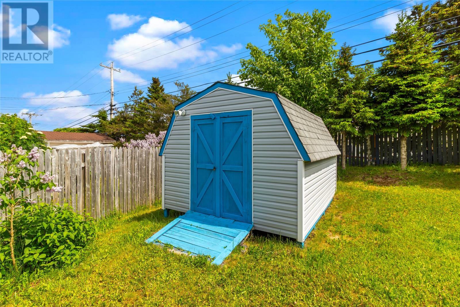 Fenced back yard with shed, patio and walkout basement door - 7 Penney Crescent, St John'S, NL