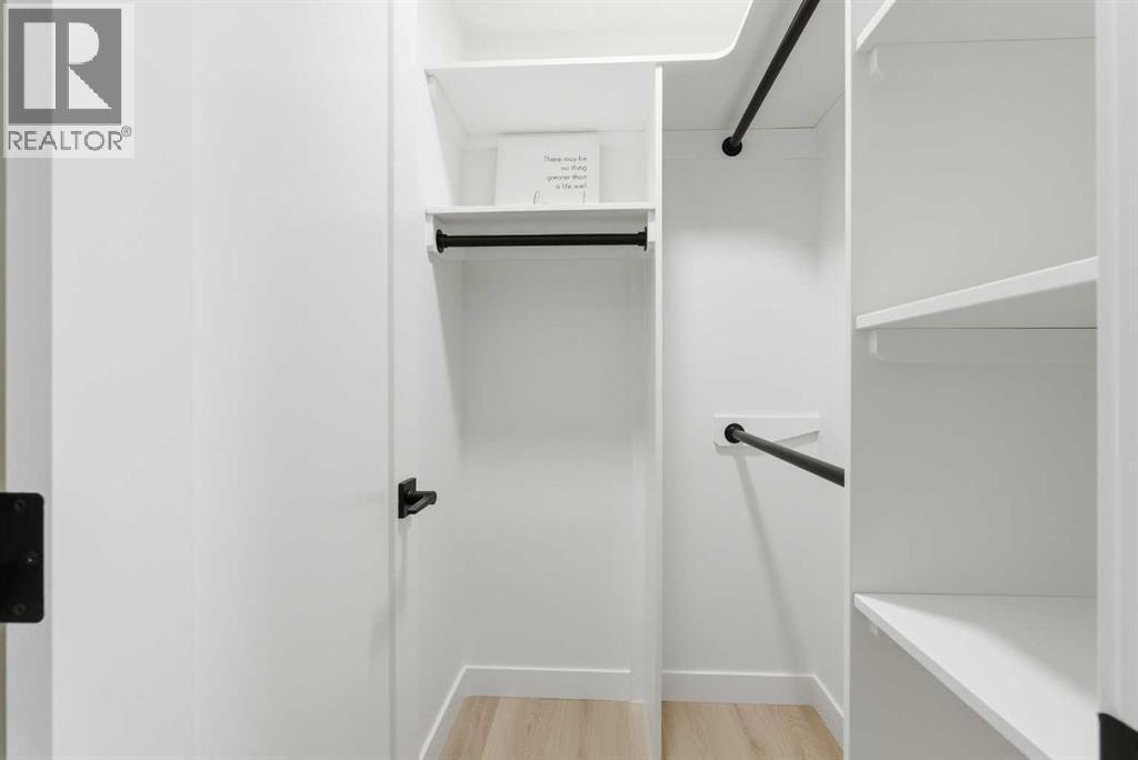 Main floor jacket walk-in closet - 4904 Valiant Drive Nw, Calgary, AB