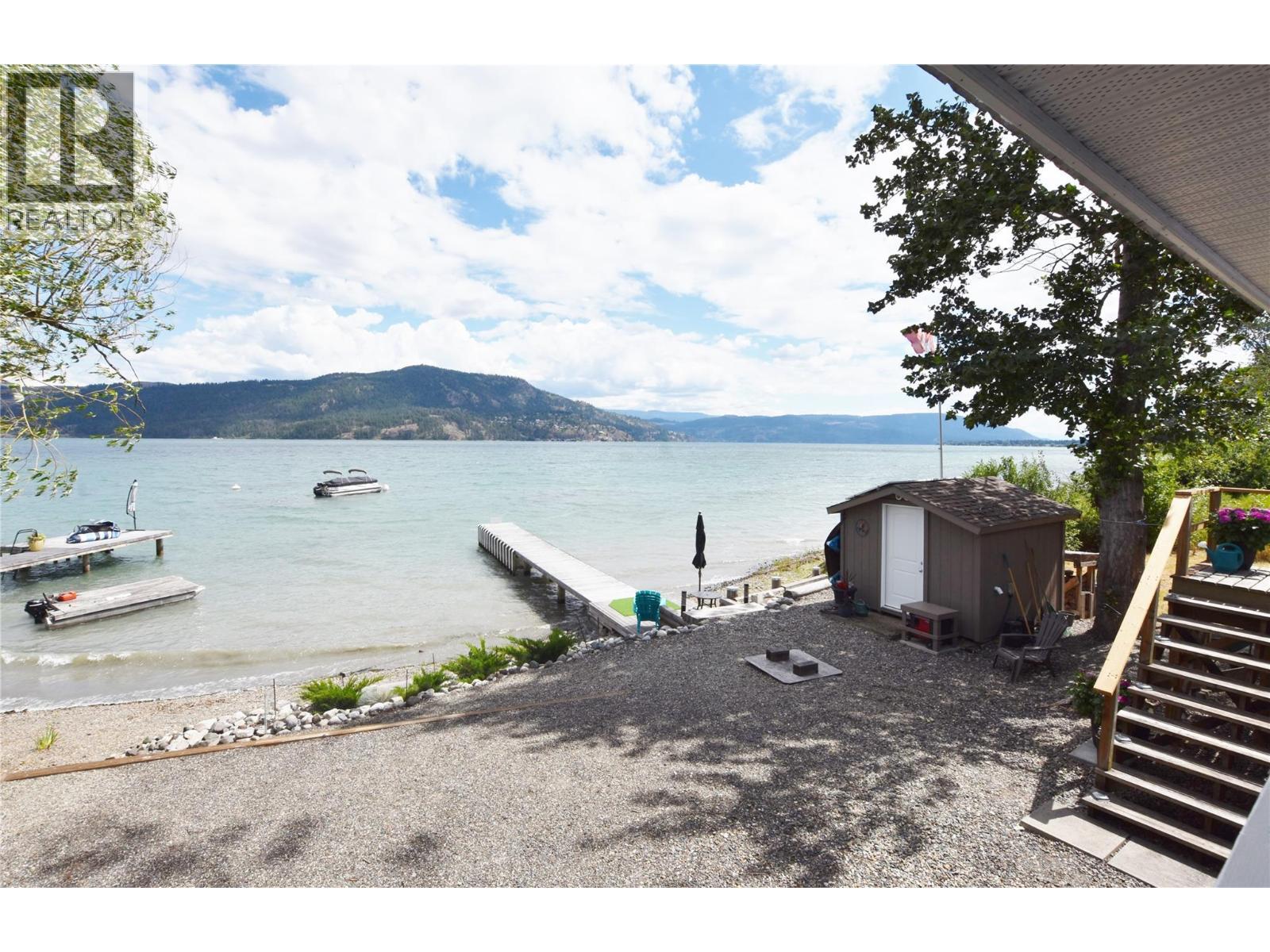 looking down to the beach - 1 Imtil Road, Vernon, BC - Outdoor With Body Of Water With View