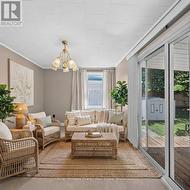 Staged Back Sunroom or Bedroom -