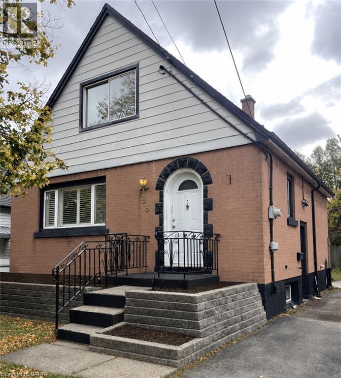 Brick exterior with contrasting siding on the upper gable - 83 East 41St Street, Hamilton, ON - Outdoor