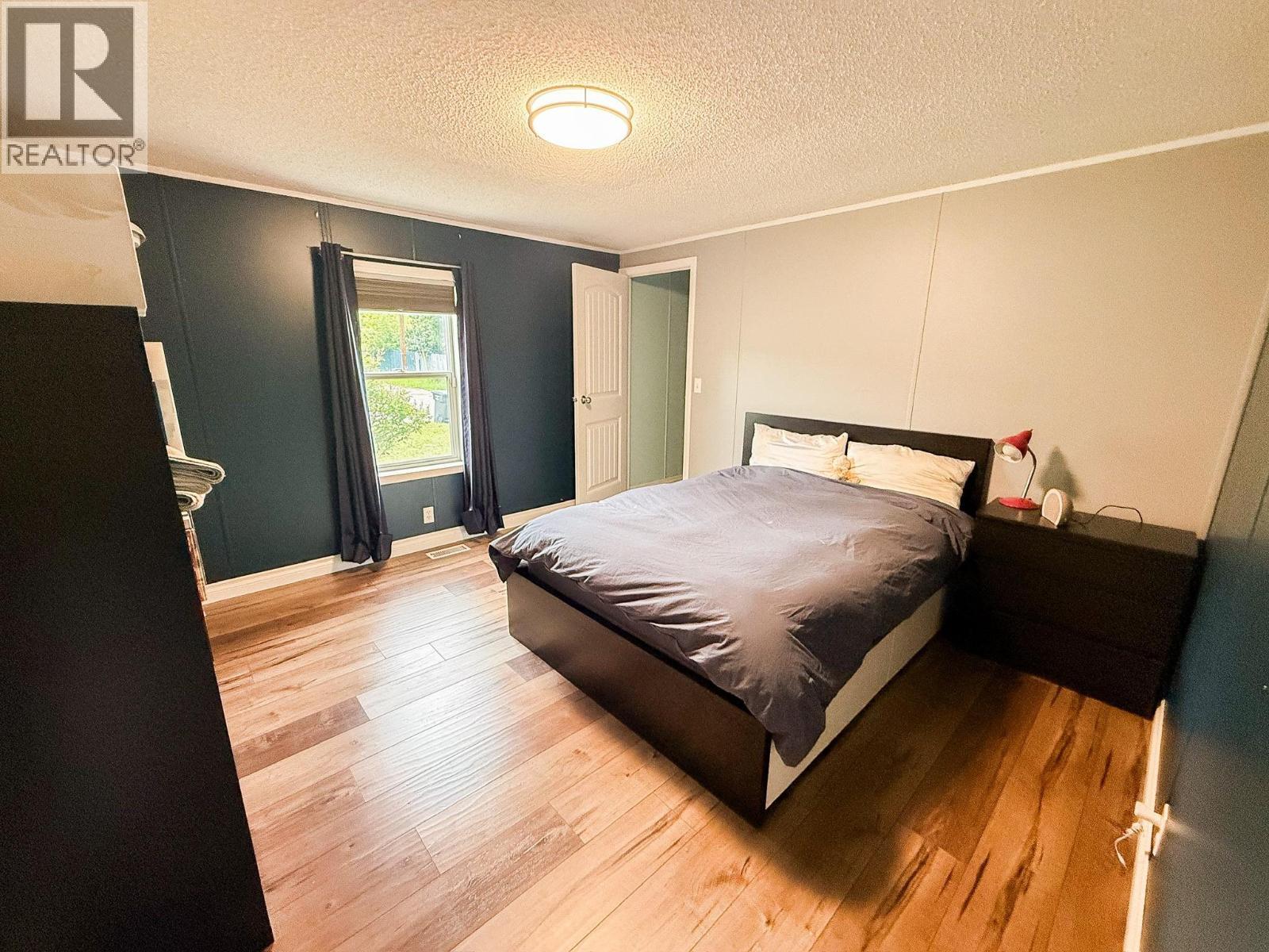 9805 E 98 Avenue, Taylor, BC - Indoor Photo Showing Bedroom