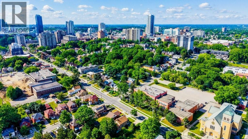Expansive urban landscape featuring a mix of residential structures and commercial buildings - 153 Courtland Avenue E, Kitchener, ON