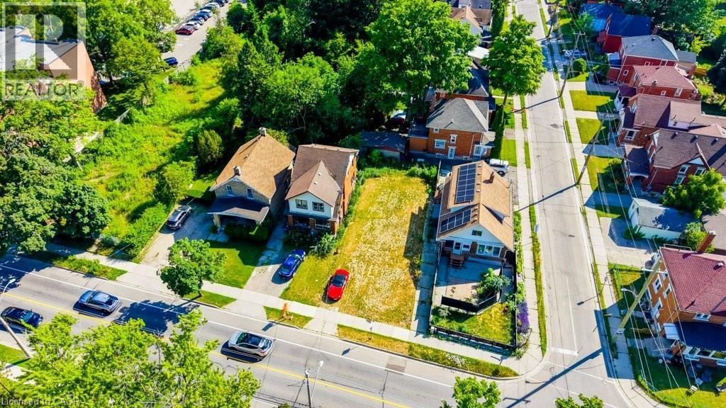 Expansive developable lot situated on a corner, bordered by existing residential properties - 153 Courtland Avenue E, Kitchener, ON