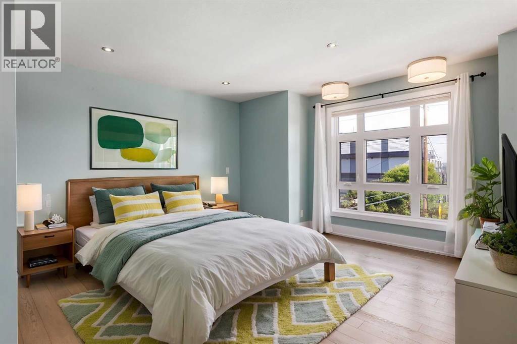 Virtually staged primary bedroom #1 - 1513 23 Avenue Sw, Calgary, AB