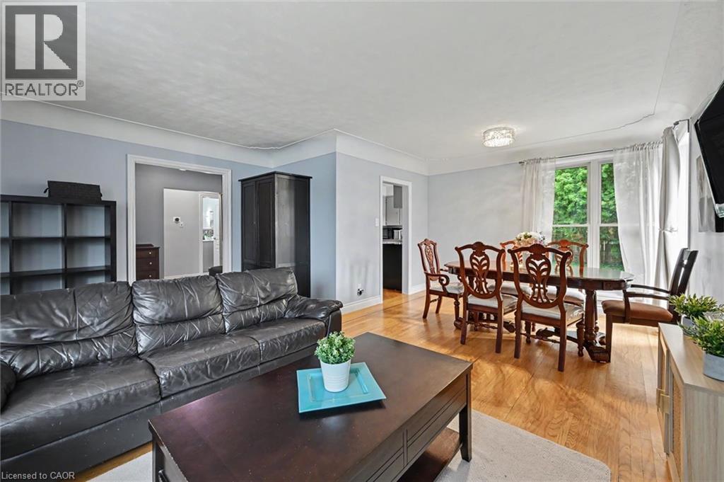 Hardwood flooring throughout the main living and dining areas - 56 Everton Place, Hamilton, ON