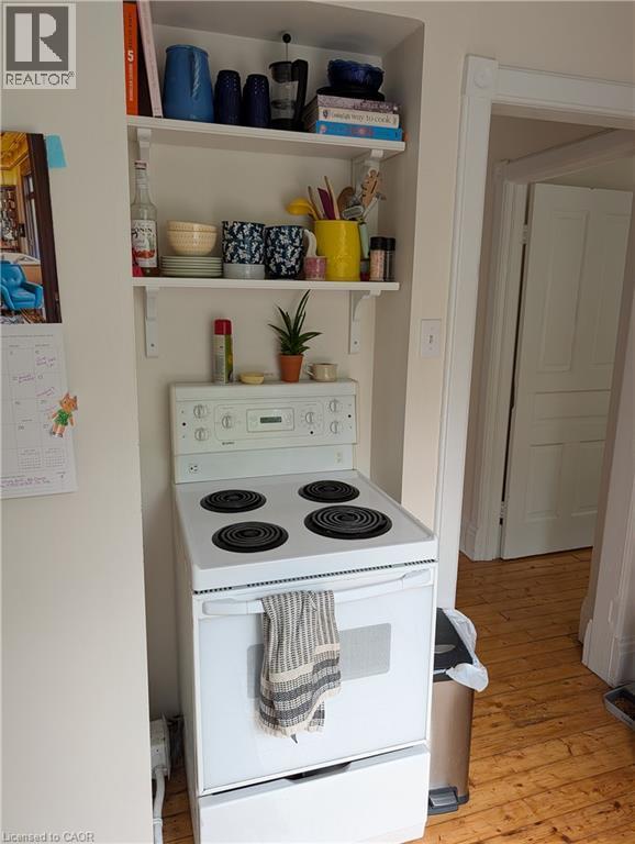 White electric range with four coil burners - 15 Martin Street, Kitchener, ON