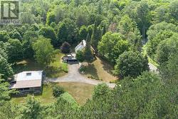 Surrounded by nature w/boat launch at end of rd -