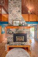 Two storey granite fireplace is a showpiece! -