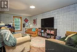 Primary loft sitting room that overlooks great rm -