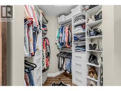 Primary walk-in closest with custom organizers. -