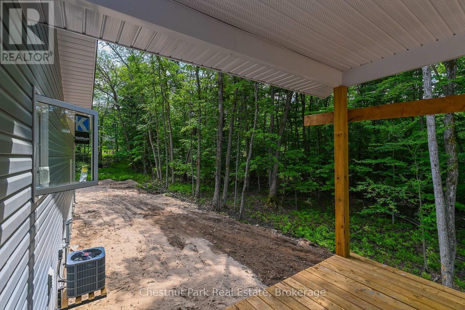 Deck off the kitchen - 23 Maple Ridge Road, Nipissing, ON - Outdoor With Deck Patio Veranda