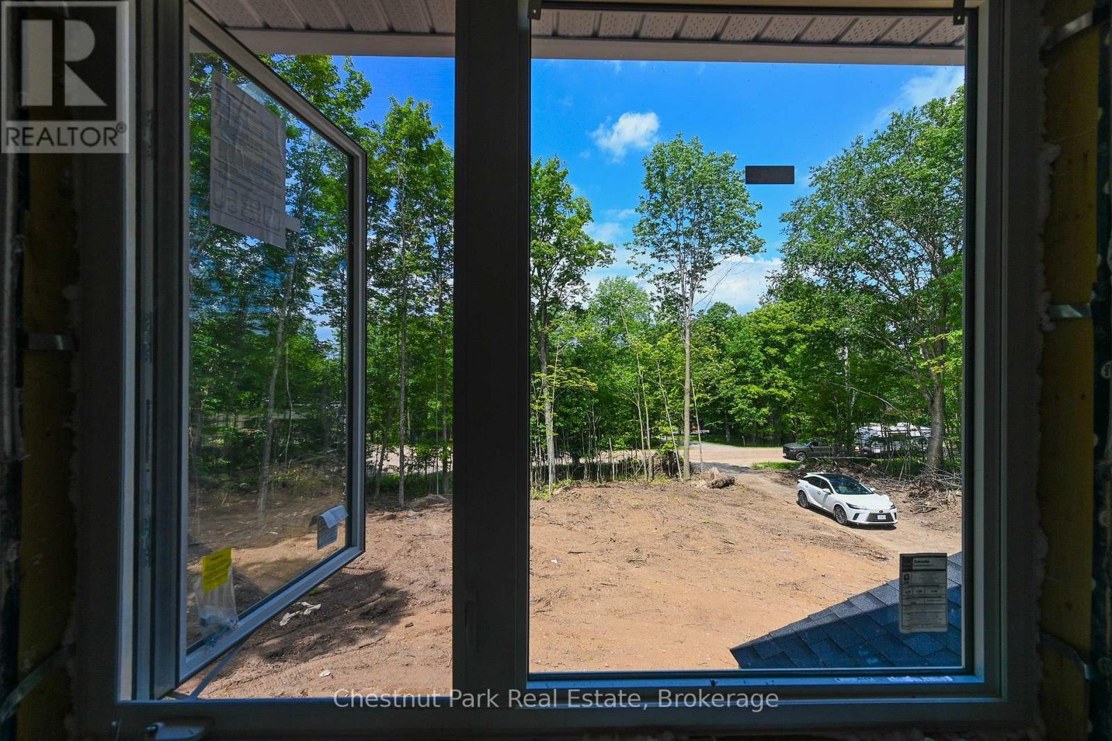 Kitchen window view of future driveway - 23 Maple Ridge Road, Nipissing, ON -