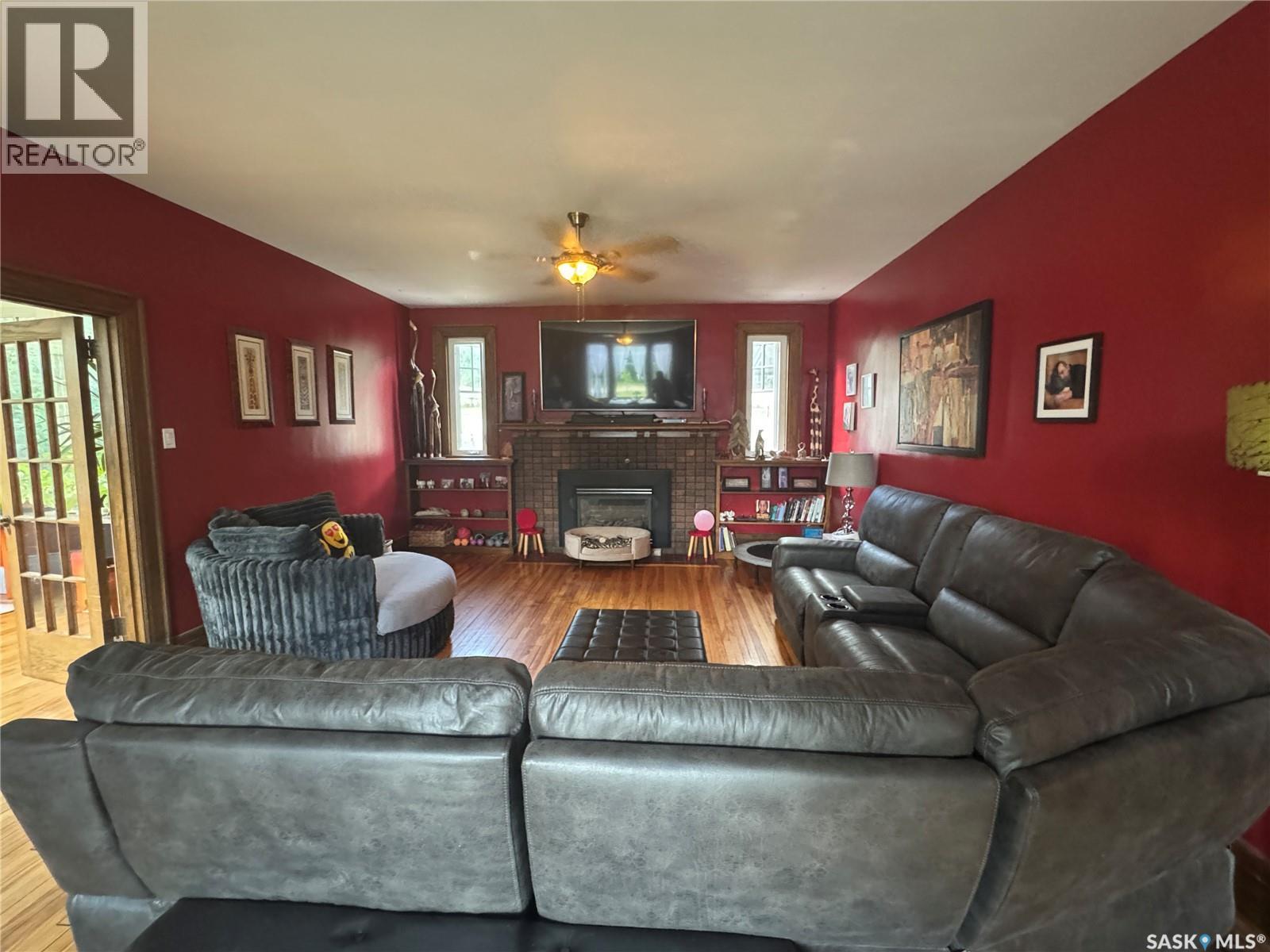 607 Barnett Drive, Fort San, SK - Indoor Photo Showing Living Room With Fireplace