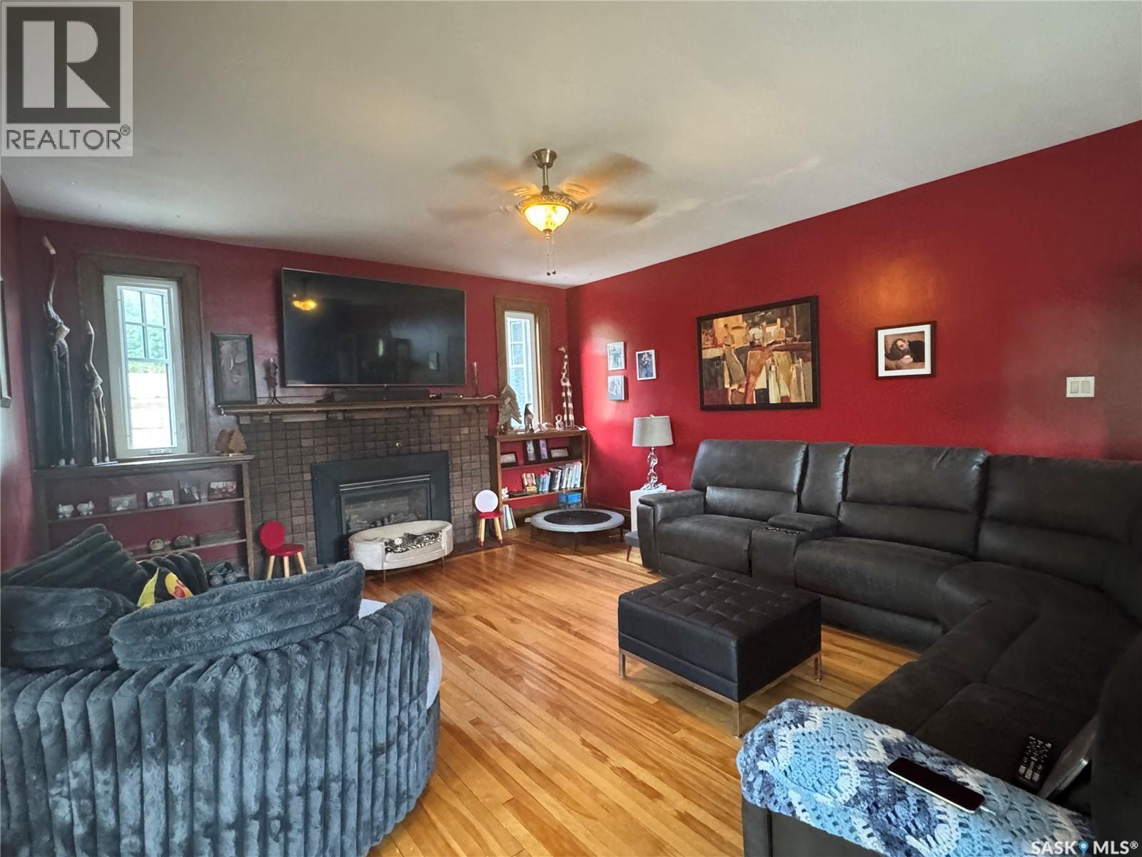 607 Barnett Drive, Fort San, SK - Indoor Photo Showing Living Room With Fireplace