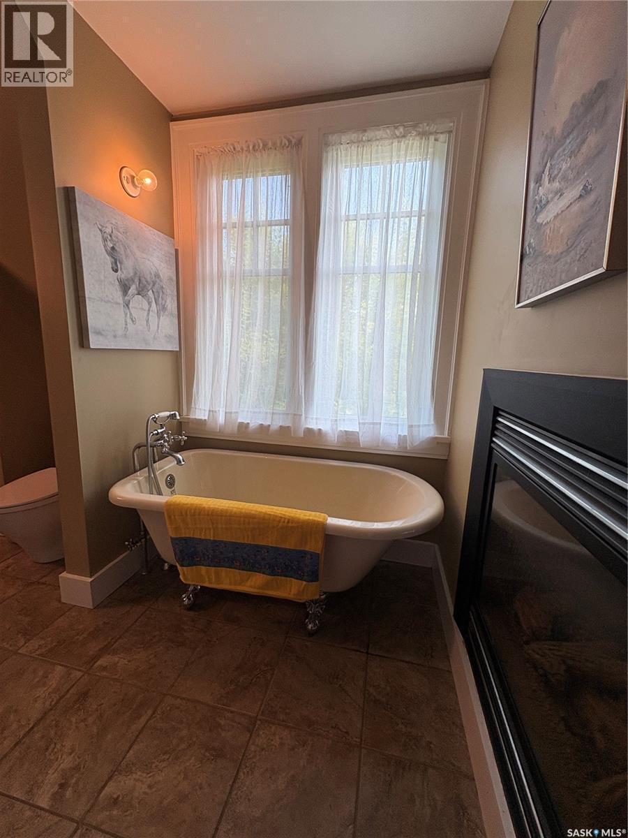 607 Barnett Drive, Fort San, SK - Indoor With Fireplace