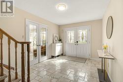 Grand Foyer with French doors to Living Room -