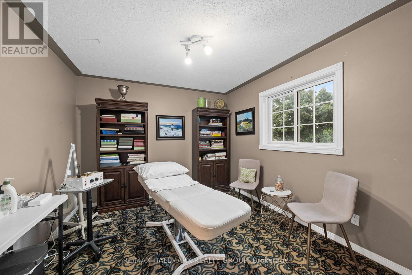 Bedroom by design currently used for Esthetics - 29 Depper Place, Ottawa, ON