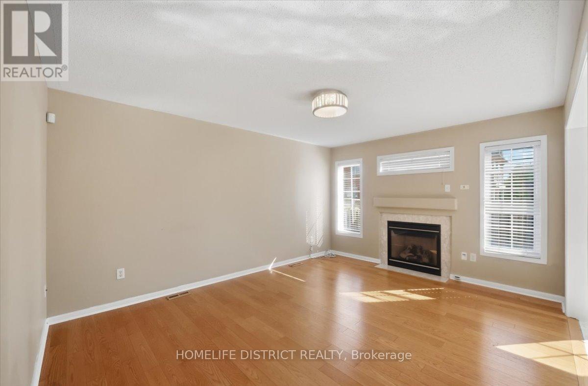 901 Bennett Boulevard, Milton, ON - Indoor Photo Showing Living Room With Fireplace